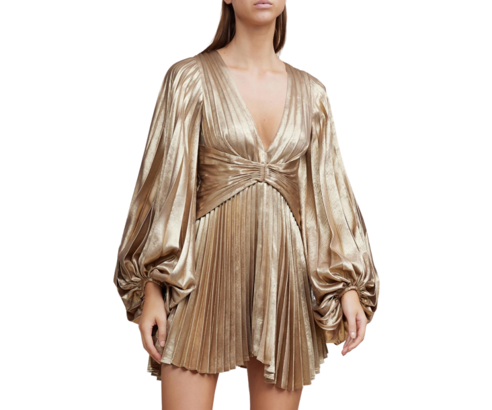 Flaunt this heavenly metallic dress just like Chrissie does - full of power and style. Source: The Iconic