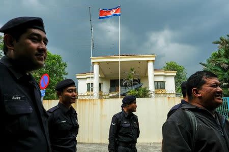 Malaysian police officers gather before a protest organized by members of the youth wing of the National Front, Malaysia's ruling coalition, in front of the North Korea embassy, following the murder of Kim Jong Nam, in Kuala Lumpur, Malaysia, February 23, 2017. REUTERS/Athit Perawongmetha/File Photo