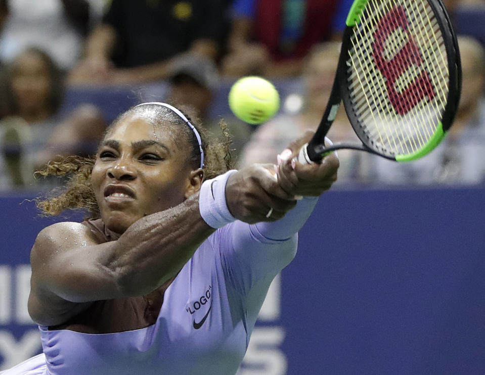 Serena Williams returns a serve by Carina Witthoeft, of Germany, during the second round of the U.S. Open tennis tournament, Wednesday, Aug. 29, 2018, in New York. (AP Photo/Julio Cortez)