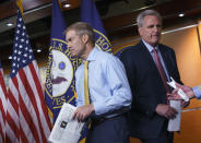 FILE - Rep. Jim Jordan, R-Ohio, left, and House Minority Leader Kevin McCarthy, R-Calif., exchange places at the microphones during a news conference after House Speaker Nancy Pelosi rejected two of McCarthy's picks for the committee investigating the Jan. 6 Capitol insurrection, at the Capitol in Washington, on July 21, 2021. (AP Photo/J. Scott Applewhite, File)