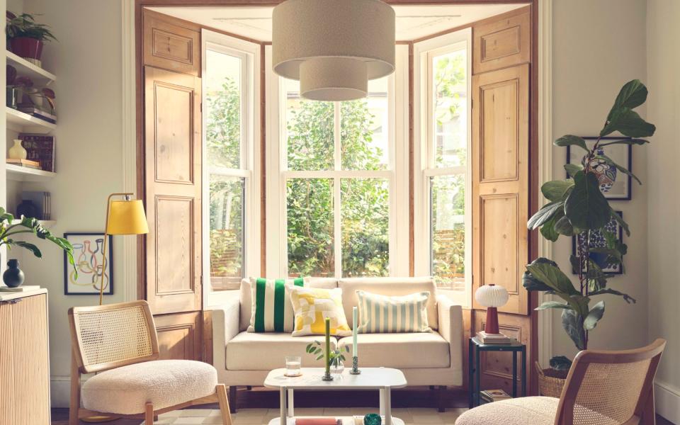 Natural wood finishes are having a moment, as seen in this sitting room by John Lewis