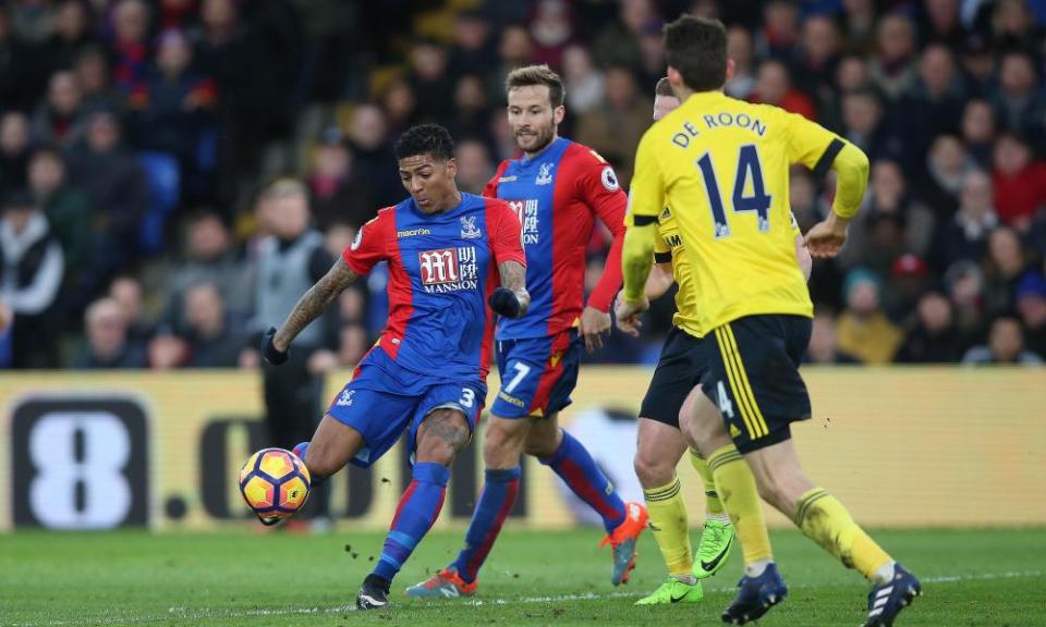 Patrick van Aanholt (left)scores the only goal of the game to earn Crystal Palace a vital victory.