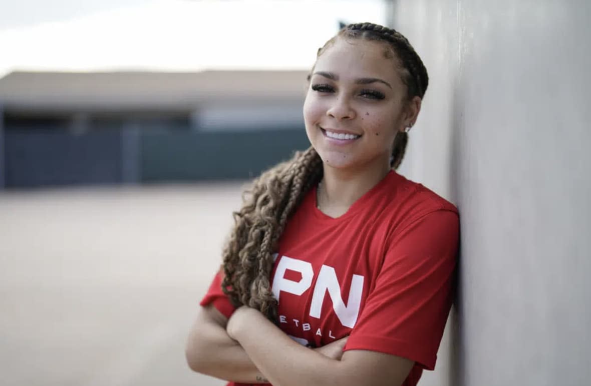 La Jolla Country Day high school basketball player Jada Williams poses for a portrait Monday, Sept. 12, 2022, in San Diego. Jada Williams has been a fixture on social media since she was 11 and stands out because of her flair for engagement. With the advent of NIL, she has parlayed her basketball skill and social media presence into six major endorsement deals that bring in a total of six figures a year. (AP Photo/Gregory Bull)