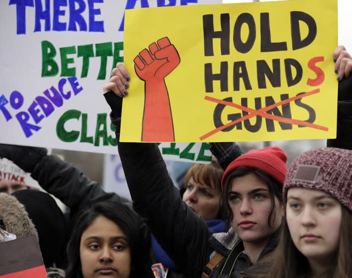 Demonstrators attend a "March for Our Lives" rally in support of gun control, Saturday, March 24, 2018, in Chicago. Students and activists across the country planned events Saturday in conjunction with a Washington march spearheaded by teens from Marjory Stoneman Douglas High School in Parkland, Fla., where over a dozen people were killed in February. (AP Photo/Nam Y. Huh)