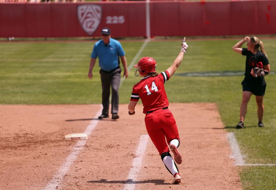 Utah’s Karlie Davison, celebrates hitting a home run as she rounds the bases as the University of Utah softball team plays Ole Miss in NCAA softball regional championship at Utah in Salt Lake City on Sunday, May 21, 2023. Utah won 4-1. | Scott G Winterton, Deseret News