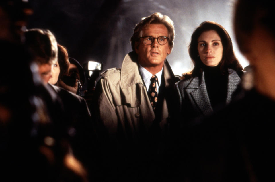 Nick Nolte and Julia Roberts stand in the spotlight