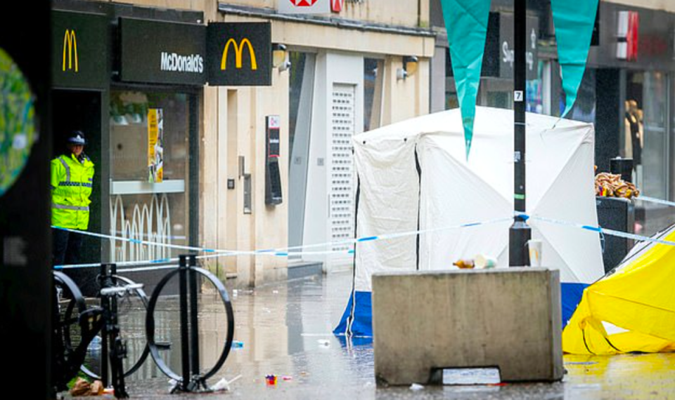 Police at the scene outside McDonald’s in Bath (SWNS)