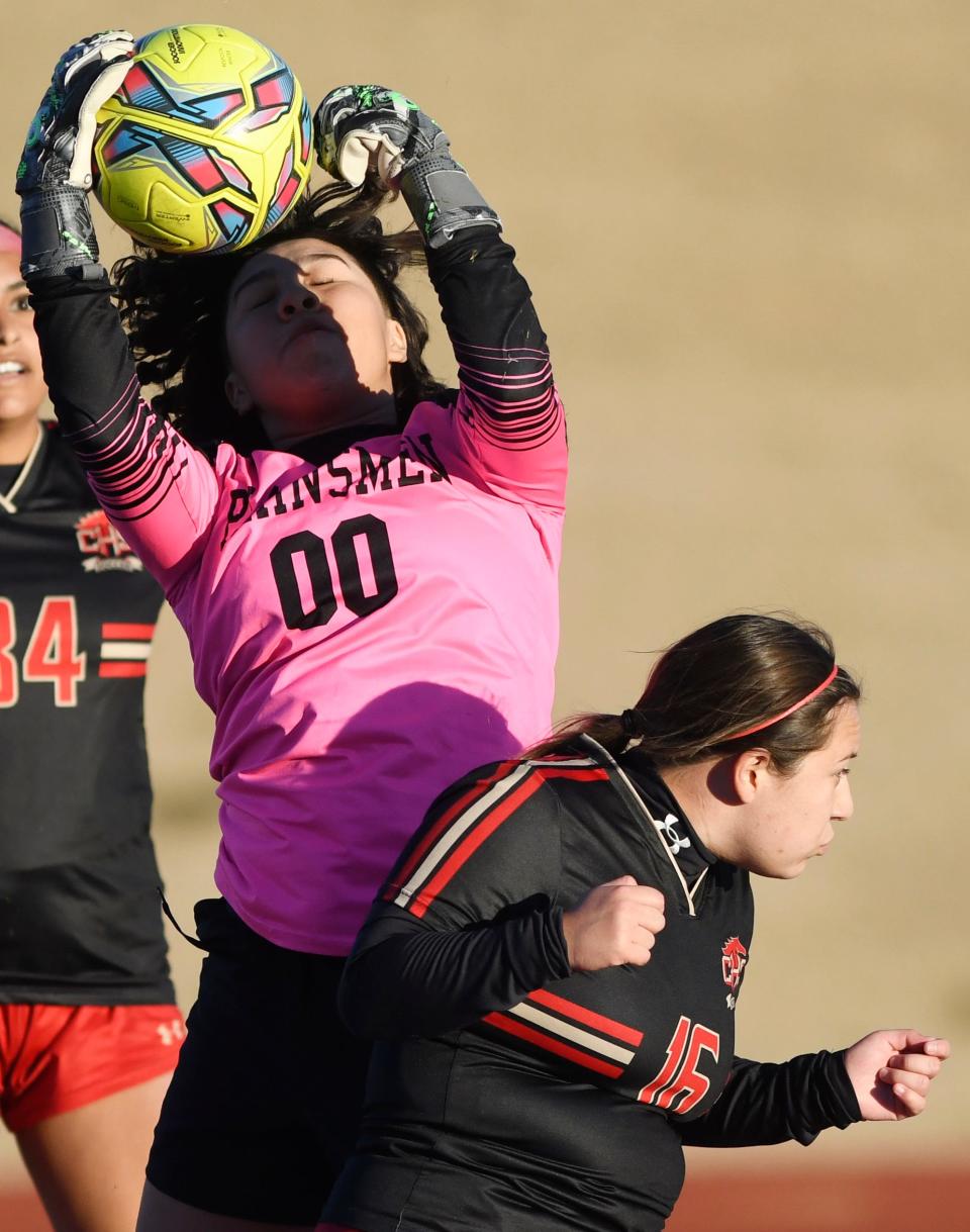 Monterey's Amerika Alvizo (00) grabs a corner kick against Coronado in a District 4-5A soccer game Friday, Jan. 27, 2023, at Lowrey Field at PlainsCapital Park.