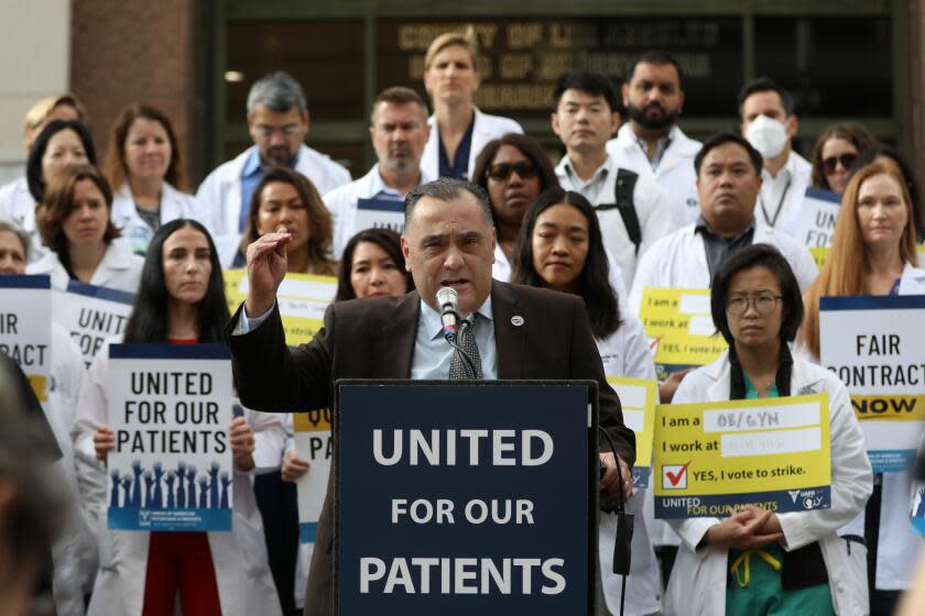 LOS ANGELES, CA NOVEMBER 7, 2023: Doug Chiappetta speaks during a press confrance with dozens of physicians, dentists, and psychiatrists outside Kenneth Hahn Hall of Administration in Los Angeles, CA November 7, 2023. Medical workers who work for Los Angeles County are weighing a possible strike. The Union of Physicians and Dentists, which represents more than 1,100 L.A. County employees, said its members are launching a vote to authorize a possible strike. Union members will be speaking outside of the L.A. County Board of Supervisors meeting and giving public comment during the meeting. (Francine Orr/ Los Angeles Times)