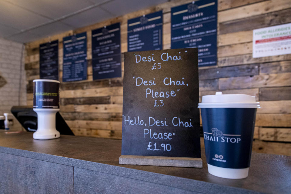 A cafe owner charges customers more than TWICE as much - if they don't order politely. See SWNS story SWSMpolite. Chaii Stop, in Preston, Lancs., has introduced a new rule to help customers remember their manners - charging them more for their drink. Usman Hussain, 29, opened the Preston-based shop selling chai, doughnuts, street food and desserts in March this year. He recently introduced a sign explaining that customers will pay different prices for the same drink depending how politely they order.  