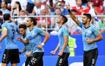 <p>The Uruguay striker takes the applause after making it 1-0 </p>