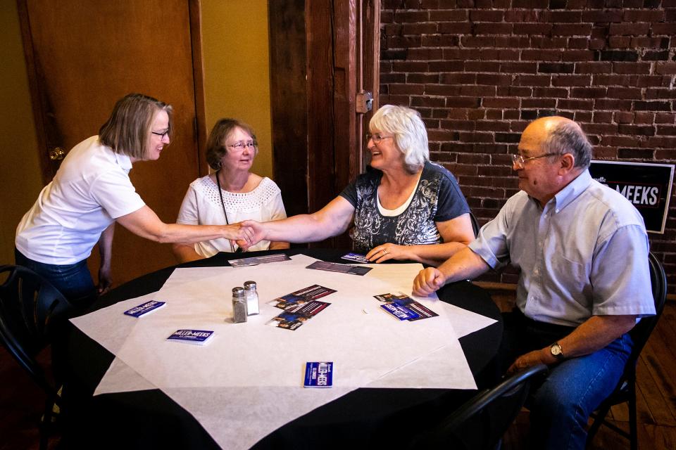 U.S. Rep. Mariannette Miller-Meeks, R-Iowa, greets guests during a campaign event, Tuesday, Aug. 16, 2022, at The Drake in Burlington, Iowa.