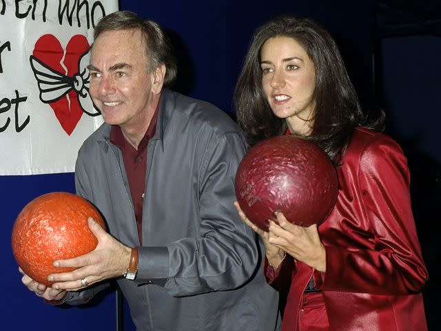 <p>Richard Corkery/NY Daily News Archive/Getty</p> Neil Diamond and daughter Elyn bowl at the benefit of the Children Who Never Forget Foundation