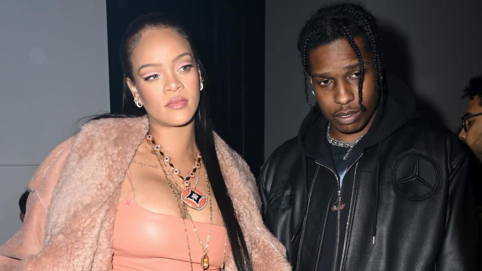 Rihanna, wearing a peach leather dress, and ASAP Rocky were seen at the Off—White show in Paris last year. - Pascal Le Segretain/Getty Images