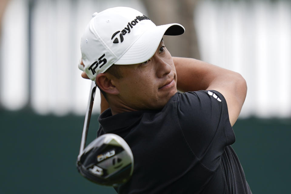 Collin Morikawa watches his tee shot on the 10th hole during first round of the Wells Fargo Championship golf tournament at the Quail Hollow Club Thursday, May 9, 2024, in Charlotte, N.C. (AP Photo/Erik Verduzco)
