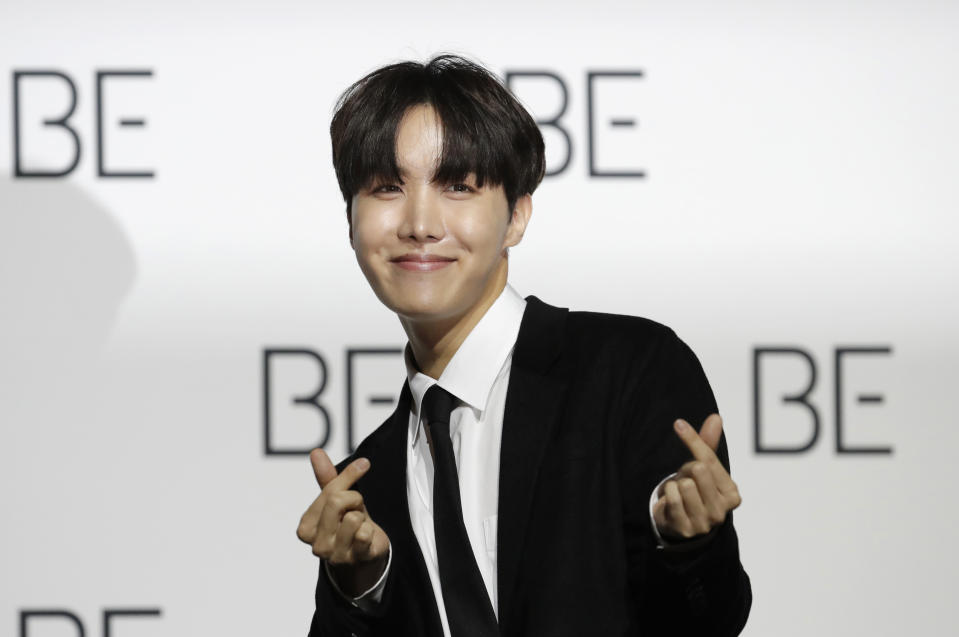 FILE - A member of South Korean K-pop band BTS J-Hope poses for photographers during a press conference to introduce their new album "BE" in Seoul, South Korea, Nov. 20, 2020. J-Hope entered a South Korean boot camp Tuesday, April 18, 2023 to start his 18-month compulsory military service, becoming the group’s second member to join the country's army. (AP Photo/Lee Jin-man, File)