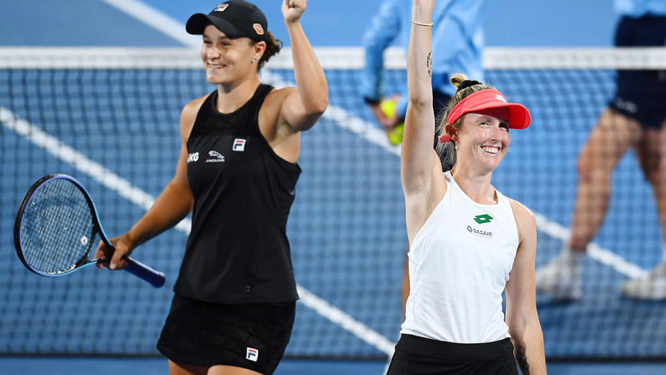 Ash Barty and Storm Sanders, pictured here celebrating after winning the doubles title at the Adelaide International.