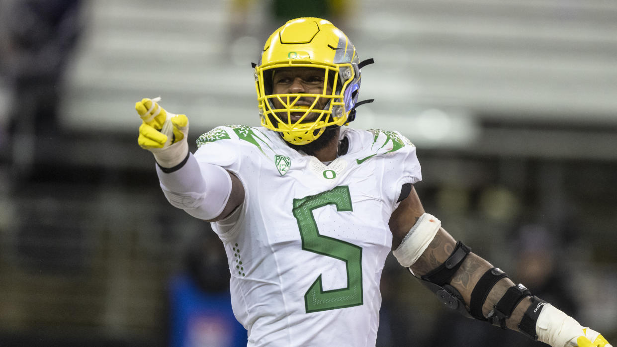 Oregon defensive end Kayvon Thibodeaux gestures during an NCAA college football game against Washington, Saturday, Nov. 6, 2021, in Seattle. Oregon won 26-16. (AP Photo/Stephen Brashear)