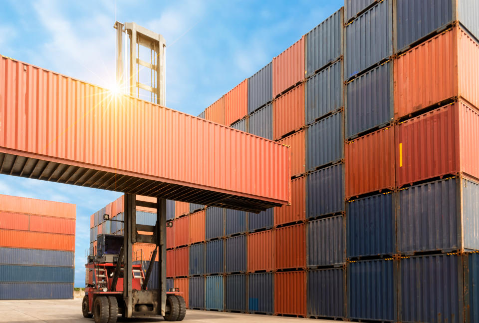 Intermodal crates stacked at a port.