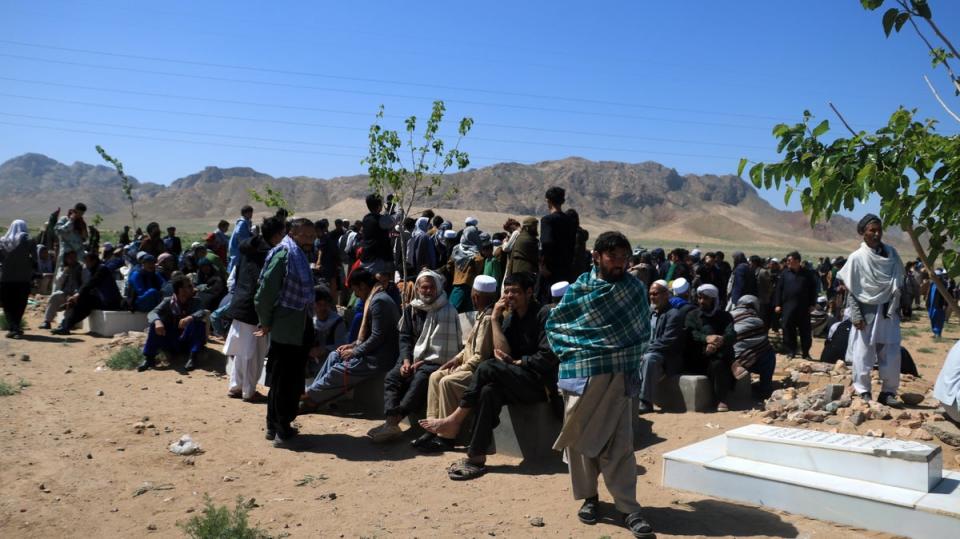 People attend the funeral of a victim of an attack on a Shi'ite Muslim mosque in Herat, Afghanistan, (EPA)