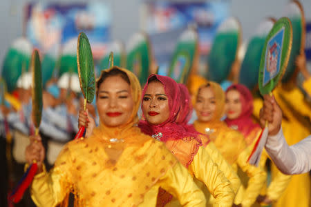 Cambodian dancers attend a ceremony to mark the 39th anniversary of the toppling of Pol Pot's Khmer Rouge regime, in Phnom Penh, Cambodia, January 7, 2018. REUTERS/Samrang Pring