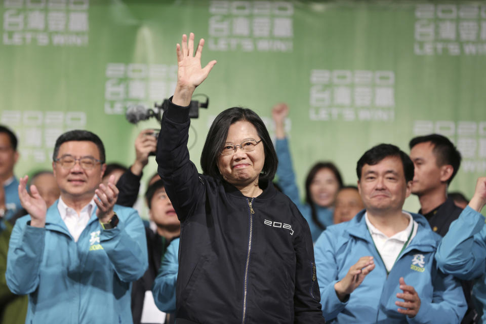 Taiwan's 2020 presidential election candidate, Taiwanese President Tsai Ing-wen celebrates her victory with supporters in Taipei, Taiwan, Saturday, Jan. 11, 2020. Taiwan's independence-leaning President Tsai Ing-wen won a second term in a landslide election victory Saturday, signaling strong support for her tough stance against China. (AP Photo/Chiang Ying-ying)