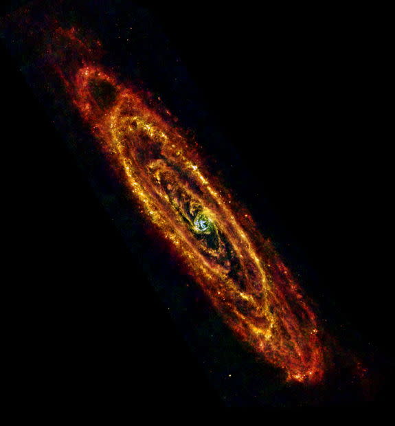 ESA Herschel space observatory image of Andromeda (M31) using both PACS and SPIRE instruments to observe at infrared wavelengths of 70 mm (blue), 100 mm (green) and 160 mm and 250 mm combined (red). Image released Jan. 28, 2013.