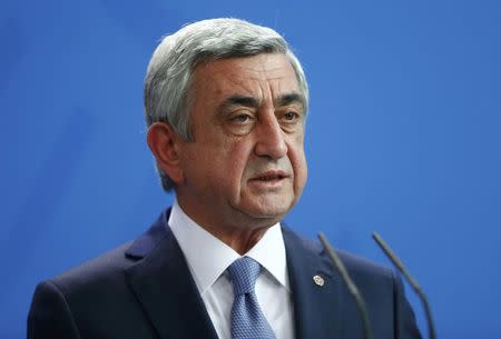 Armenia's President Serzh Sargsyan addresses a news conference after talks with German Chancellor Angela Merkel at the Chancellery in Berlin, Germany, April 6, 2016. REUTERS/Hannibal Hanschke