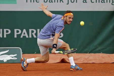 Tennis - French Open - Roland Garros - Nick Kyrgios of Australia v Marco Cecchinato of Italy - Paris, France - 22/05/16. Marco Cecchinato returns the ball. REUTERS/Benoit Tessier