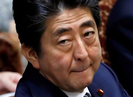 FILE PHOTO: Japan's Prime Minister Shinzo Abe at an upper house parliamentary session in Tokyo, Japan March 28, 2018. REUTERS/Issei Kato/File Photo