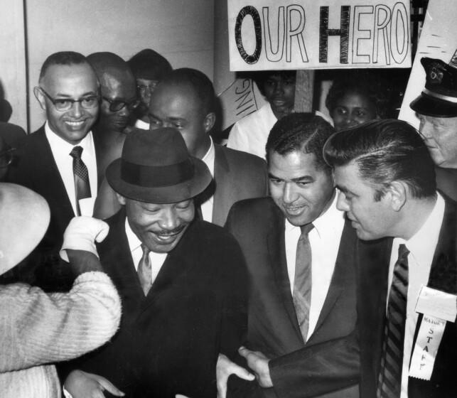 Feb. 24, 1965 -- Rev. Martin Luther King receives warm welcome on his arrival in Los Angeles. Photo by: Jack Carrick / LA Times.