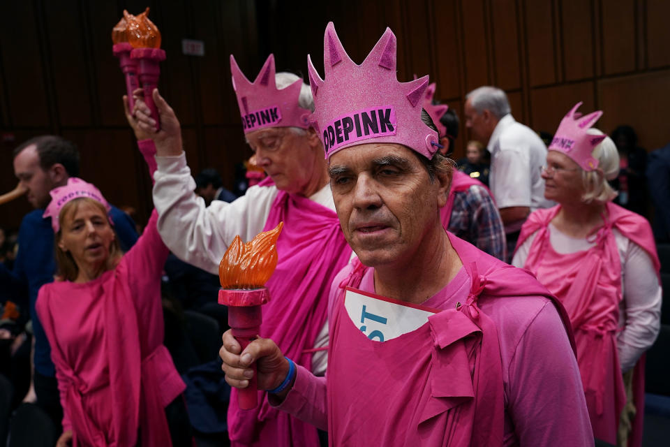 Members of Code Pink for Peace protest before the start of a hearing where U.S. Attorney General Jeff Sessions will testify to the Senate Judiciary Committee in the Hart Senate Office Building on Capitol Hill on Oct. 18, 2017. Committee members questioned Sessions about conversations he had with President Donald Trump about the firing of former FBI Director James Comey, the Deferred Action for Childhood Arrivals (DACA) policy, the ongoing investigation about Russian interference in the 2016 presidential election and other subjects.