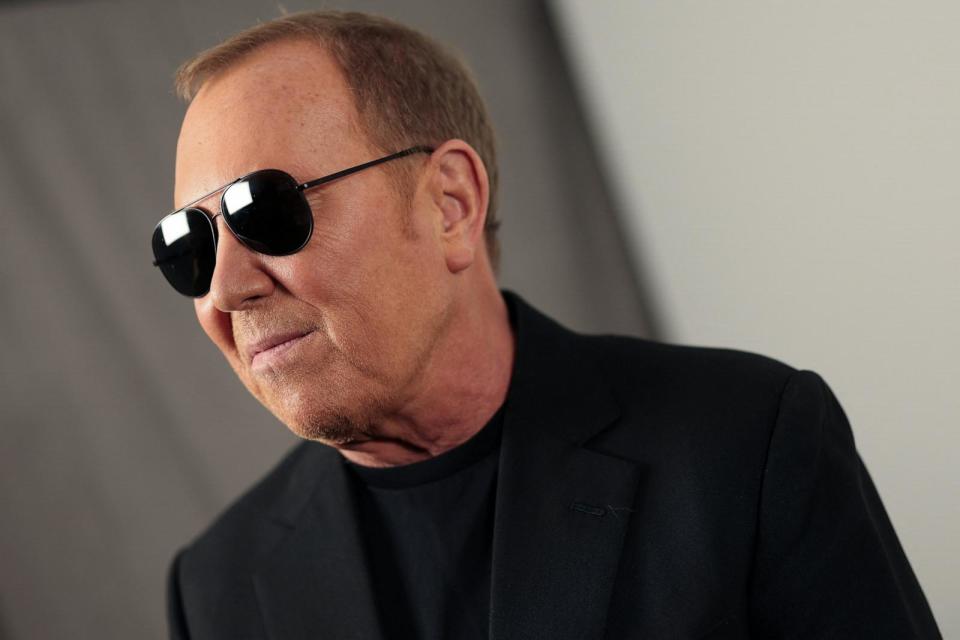 PHOTO: Designer Michael Kors speaks during an interview with Reuters before the presentation of the Michael Kors Fall/Winter 2024 collection during New York Fashion Week, in New York City, Feb. 13, 2024.  (Mike Segar/Reuters)