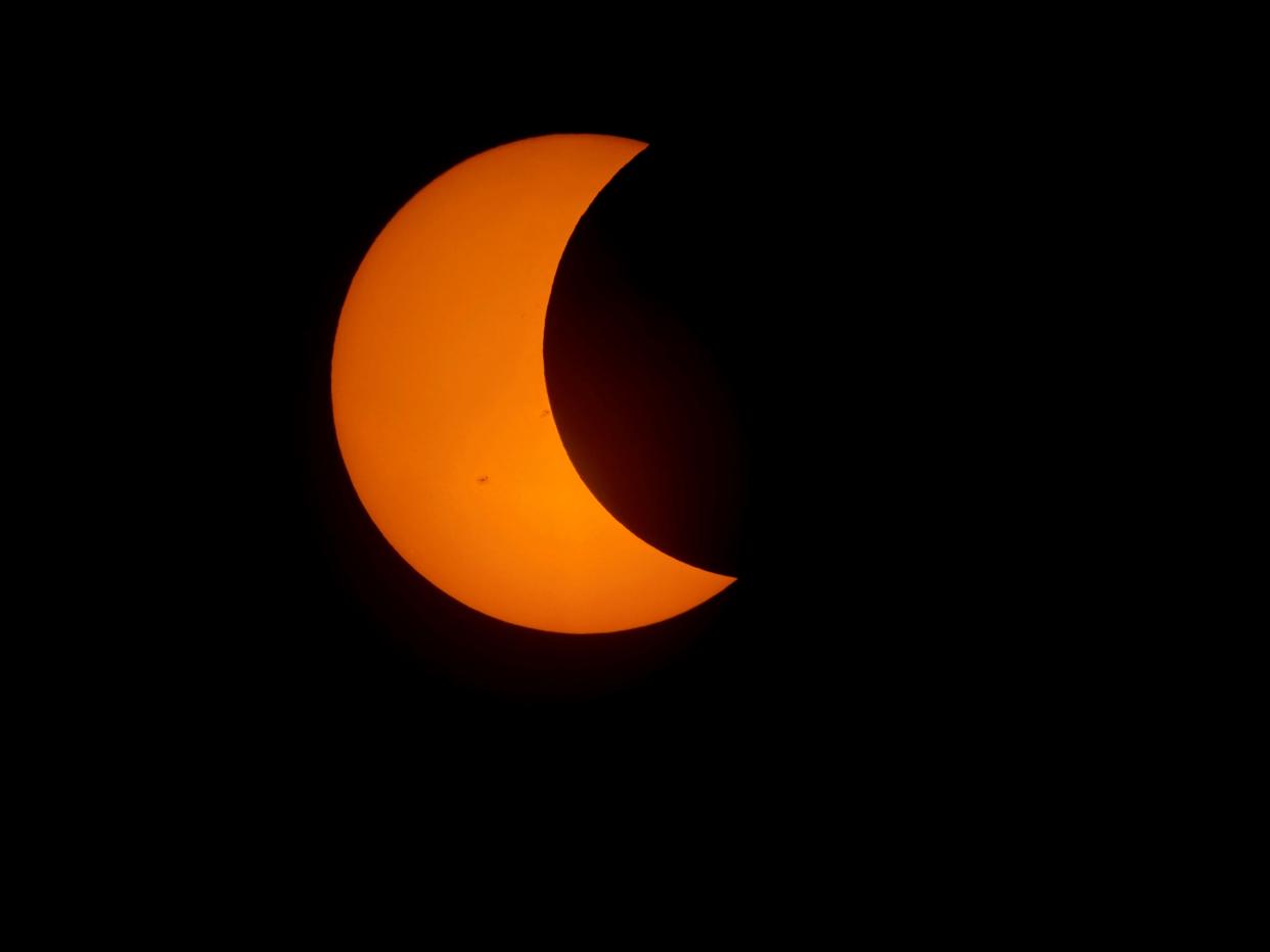 It all starts as the moon appears to take a chunk out of the sun.