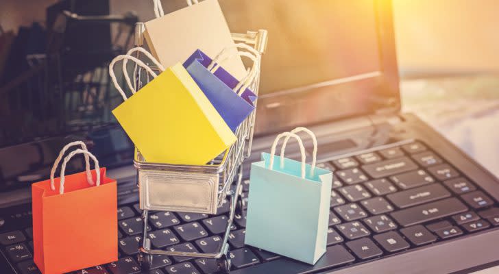 Image of small shopping bags sitting in a shopping cart on a computer