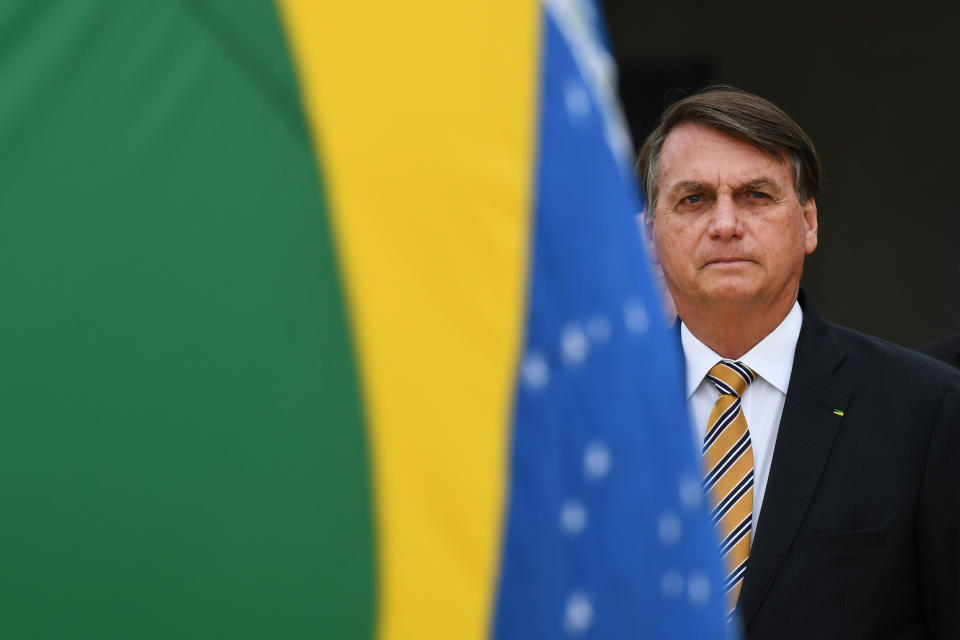 Brazilian President Jair Bolsonaro found refuge from international scorn in former President Donald Trump's climate denial. Under President Joe Biden, the U.S. is attempting to force the Brazilian leader to take aggressive steps to curb deforestation. (Photo: EVARISTO SA via Getty Images)