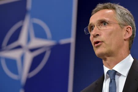 NATO Secretary General Jens Stoltenberg addresses a news conference after a meeting of North Atlantic Council (NAC) in Defense Ministers session at the NATO headquarters in Brussels, Belgium, June 24, 2015. REUTERS/Eric Vidal