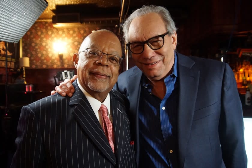 Host Henry Louis Gates, Jr with comedian Lewis Black