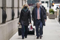 Attorneys Laura Menninger, left, and Jeffrey Pagliuca arrive to court in New York, Wednesday, Dec. 8, 2021. (AP Photo/Seth Wenig)