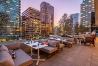 <p><a href="https://www.wayfarerdtla.com/downtown-la-dining/rooftop" rel="nofollow noopener" target="_blank" data-ylk="slk:The Rooftop;elm:context_link;itc:0" class="link ">The Rooftop</a> at The Wayfarer is a pretty chill place to hang out, thanks to its comfy booths and laid-back feel. It’s also open for brunch, lunch, dinner, and as a bar—so you can enjoy the LA skyline whenever you please. </p><p><strong><a href="https://www.google.com/maps/reviews/@34.0471338,-118.2606329,17z/data=!3m1!4b1!4m6!14m5!1m4!2m3!1sChdDSUhNMG9nS0VJQ0FnSURXZ0tfYnFnRRAB!2m1!1s0x0:0x7c6600fad4b5592c?hl=en-US" rel="nofollow noopener" target="_blank" data-ylk="slk:Glowing review;elm:context_link;itc:0" class="link ">Glowing review</a></strong>: "What a fun rooftop dining and bar experience right in downtown LA! As a cookbook author, I always enjoy eating out and appreciate good food, nicely plated. The Rooftop did not disappoint."</p>