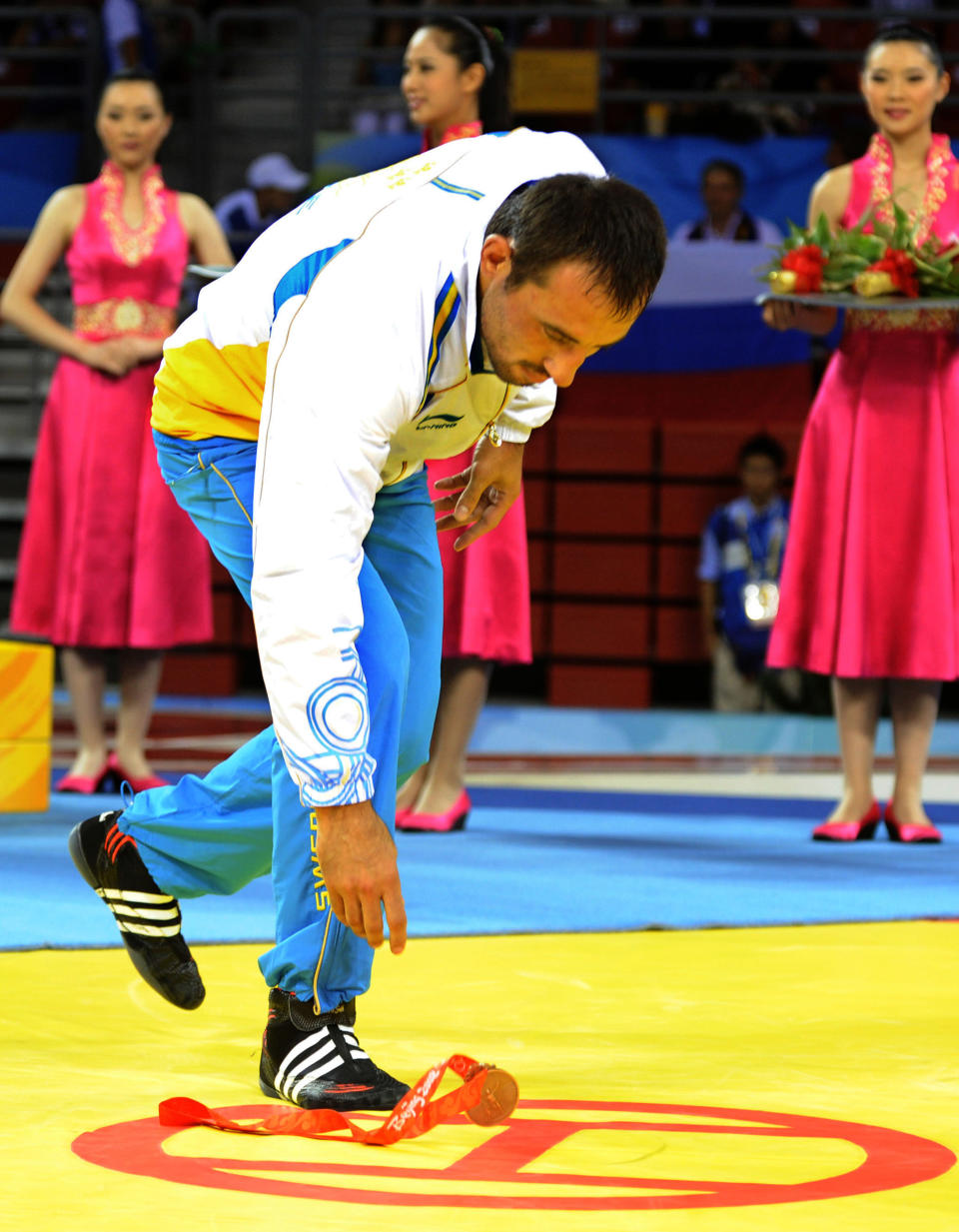 Log this one in the bad decisions file. At the 2008 Beijing Games, Swedish wrestler Ara Abrahamian became the fourth athlete <a href="http://voices.yahoo.com/swedish-wrestler-ara-abrahamian-stripped-medal-1828272.html?cat=14" data-ylk="slk:stripped of his medal;elm:context_link;itc:0;sec:content-canvas;outcm:mb_qualified_link;_E:mb_qualified_link;ct:story;" class="link  yahoo-link">stripped of his medal</a> that summer. The other three were for doping. His was for petulance. After a disputed call cost him a match in the Greco-Roman 84-kg semifinal, his teammates had to restrain him from going after the official. He won the bronze medal match, but didn't cool off in time for the medal ceremony, where he ditched his medal on the mat and walked off. The IOC kept the medal and kicked Abrahamian out of the athletes' village.