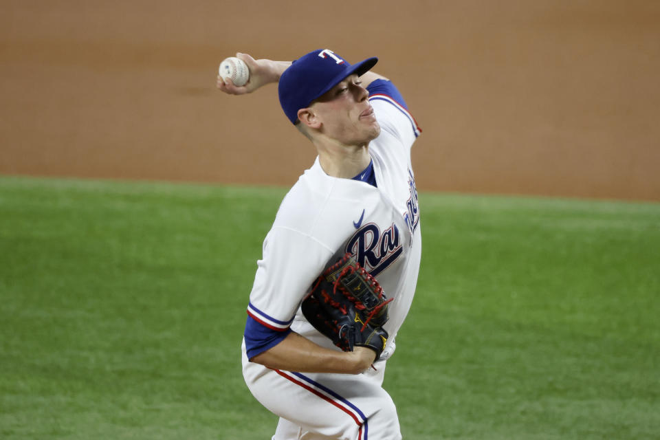 Texas Rangers starting pitcher Kolby Allard throws against the Minnesota Twins during the first inning of a baseball game Saturday, June 19, 2021, in Arlington, Texas. (AP Photo/Michael Ainsworth)