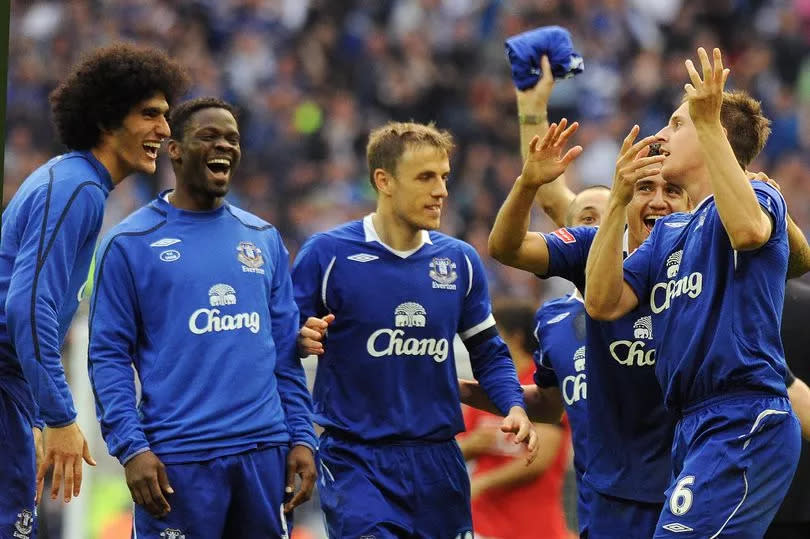 Everton's Phil Jagielka celebrates with team-mates after their 4-2 penalty shoot-out victory over Manchester United in the FA Cup semi-final at Wembley on April 19, 2009