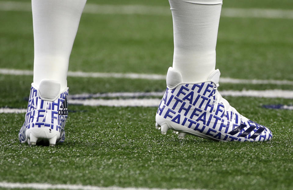 Cowboys QB Dak Prescott wore cleats on Thursday night saying “Faith.” His “Faith, Fight, Finish” foundation brings awareness to cancer, which claimed his mother. (AP)