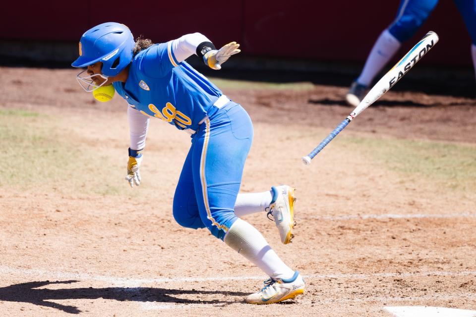 UCLA utility Kennedy Powell (10) runs into the ball after bunting during an NCAA softball game between Utah and UCLA at Dumke Family Softball Stadium in Salt Lake City on April 29, 2023. | Ryan Sun, Deseret News