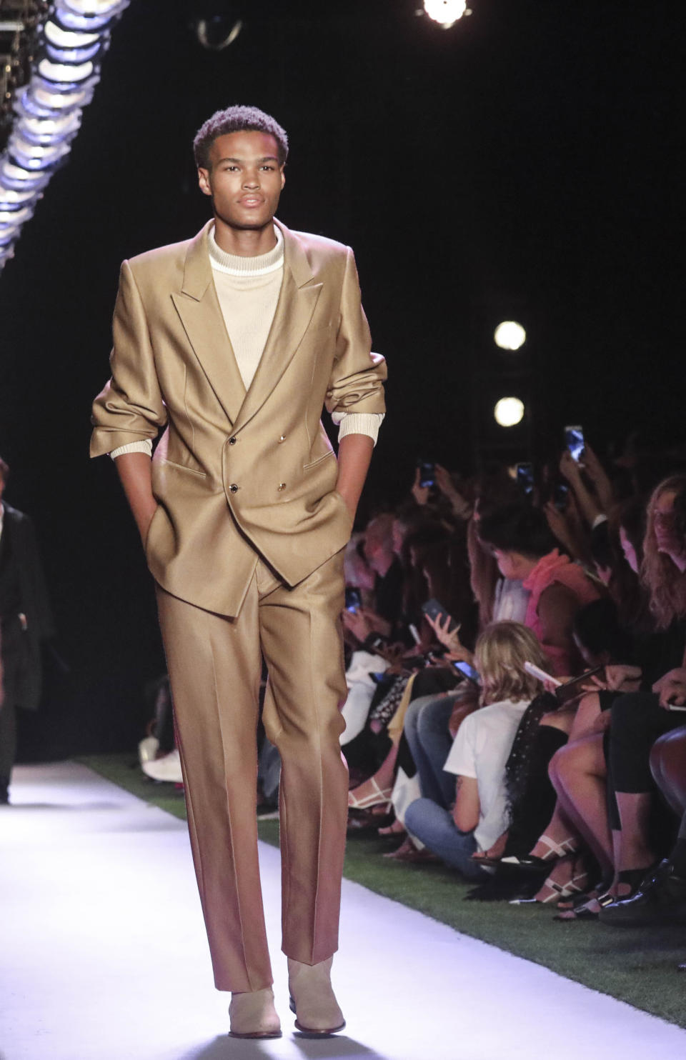 The latest fashion creation from Brandon Maxwell is modeled during New York Fashion Week, Saturday, Sept. 7, 2019, in the Brooklyn borough of New York. (AP Photo/Bebeto Matthews)