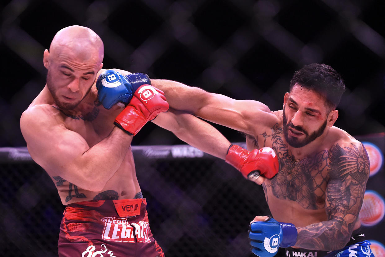 INGLEWOOD, CA - JANUARY 20:  Henry Corrales (blue gloves) and Georgi Karakhanyan (blue gloves) during the their Featherweight fight at Bellator 192 at The Forum on January 20, 2018 in Inglewood, California. Corrales won by unaniomus decision.  (Photo by Jayne Kamin-Oncea/Getty Images)