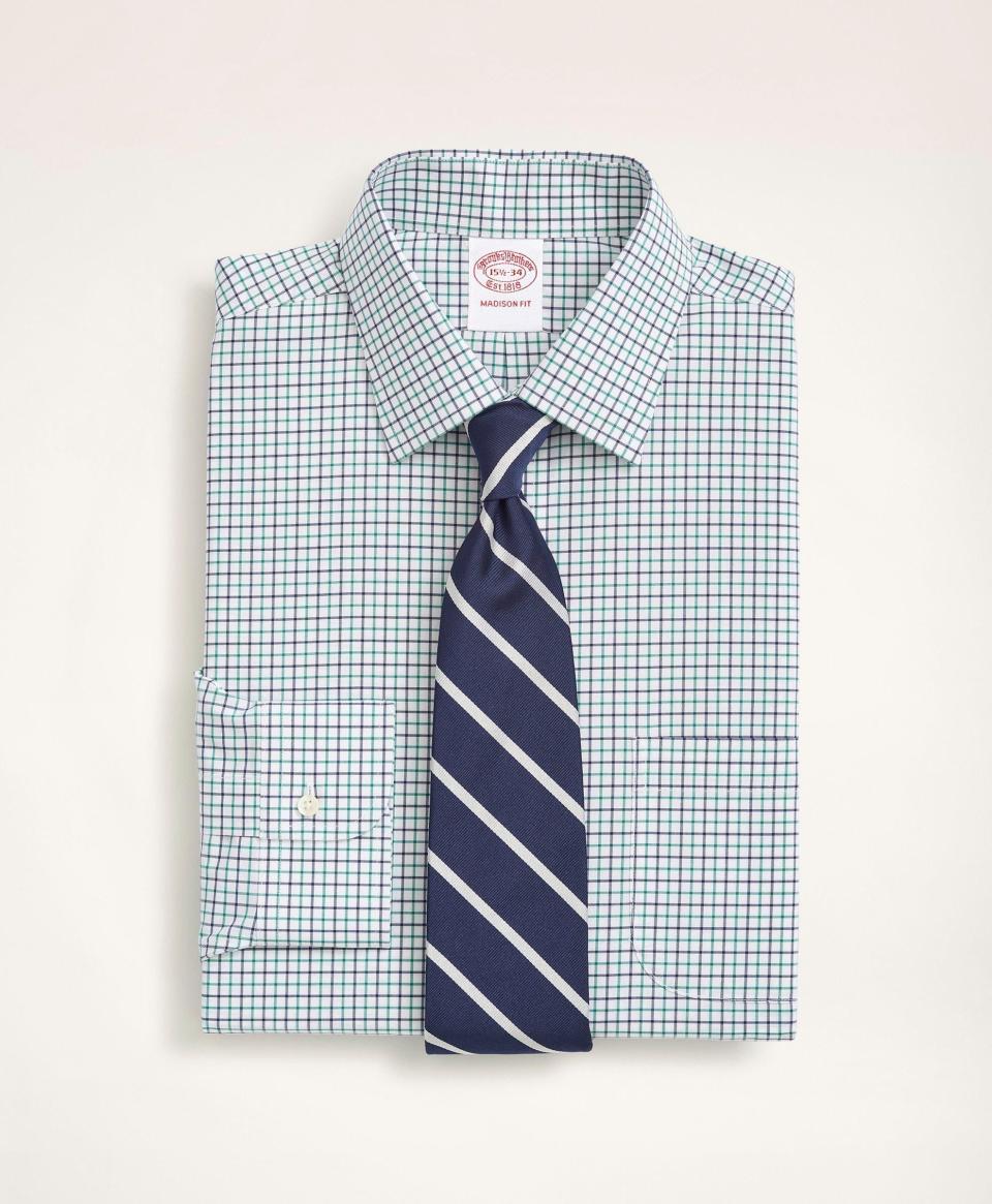 <p><a href="https://go.redirectingat.com?id=74968X1596630&url=https%3A%2F%2Fwww.brooksbrothers.com%2Fstretch-madison-relaxed-fit-dress-shirt%252C-non-iron-poplin-ainsley-collar-tattersall%2FME04448.html&sref=https%3A%2F%2F" rel="nofollow noopener" target="_blank" data-ylk="slk:Shop Now;elm:context_link;itc:0;sec:content-canvas" class="link ">Shop Now</a></p><p>Stretch Madison Relaxed-Fit Dress Shirt</p><p>Brooks Brothers</p><p>$40.00</p>