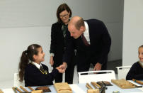 Britain's Prince William joins local school children from St Cuthbert with St Matthias CE Primary School at a copper beating workshop during the official opening of Japan House in London, Britain, September 13, 2018. Tim P. Whitby/Pool via REUTERS