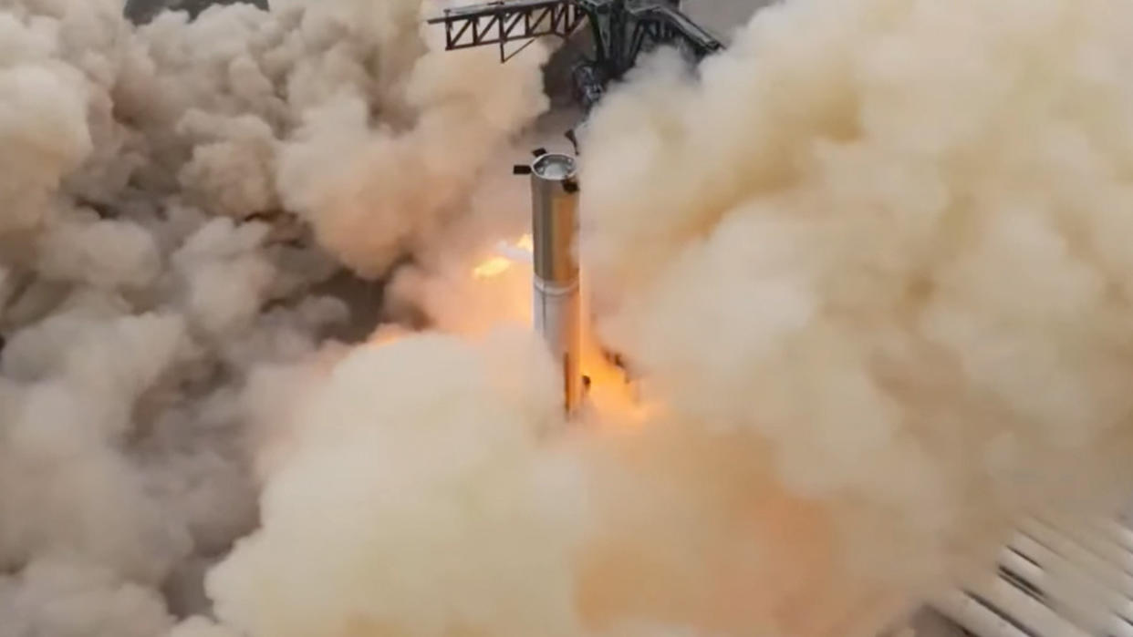  SpaceX's Booster 7 Super Heavy prototype ignites 31 of its 33 engines during a static fire test at the company's Starbase site on Feb. 9, 2023. 